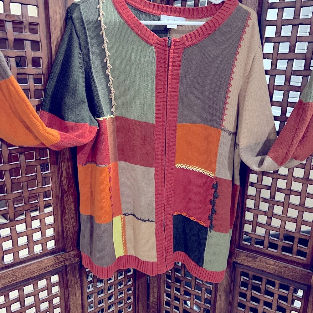 Fall zip up sweater; goes with a variety of fall colors, soft & comfortable